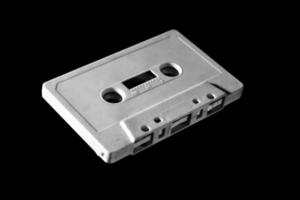 white cassette on dark background photo