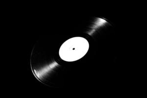 Disco de vinilo de 78 rpm sobre fondo oscuro foto