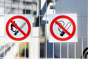 Sign Flammable on the fence of an industrial facility photo