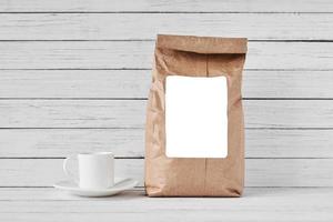 Craft paper bag on white background, copy space photo