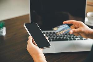 Woman hands of using online virtual app on mobile phone. Millennial guy chatting on smartphone, using banking services, reading text message, typing, shopping, making call, browsing internet.Close up photo