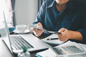 Woman hands of using online virtual app on mobile phone. Millennial guy chatting on smartphone, using banking services, reading text message, typing, shopping, making call, browsing internet.Close up photo