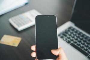 Woman hands of using online virtual app on mobile phone. Millennial guy chatting on smartphone, using banking services, reading text message, typing, shopping, making call, browsing internet.Close up photo