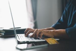 Woman hands of using online virtual app on mobile phone. Millennial guy chatting on smartphone, using banking services, reading text message, typing, shopping, making call, browsing internet.Close up photo