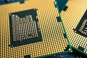 CPU, central processor unit chip Chip on circuit board in PC and laptop computer technology. photo