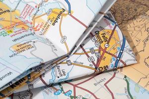 pile of maps of europe and usa, closeup photo