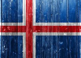 bandera de islandia sobre un fondo texturizado. collage de conceptos foto