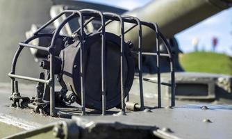 Protection elements of the military light amphibious tank PT-76. Lantern for lighting with protection on a Soviet tank, object 740. Lantern of an infantry fighting vehicle. Tank lights. photo