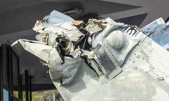 Burnt parts of the destroyed Russian Air Force combat helicopter Hind Crocodile. The wreckage of a downed helicopter. War in Ukraine. Broken military attack helicopter close-up. photo