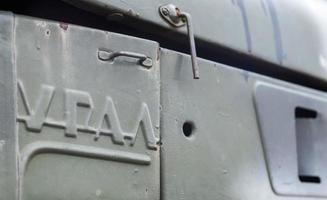 Soviet multiple launch rocket system BM-21 Grad on the chassis of a truck Ural-375D. Broken and burnt military equipment of the Russian Federation. Ural translation. Ukraine, Kyiv - October 8, 2022. photo
