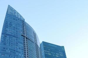 low angle view of singapore modern city buildings. photo