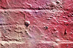 Texture of colorful graffiti paint on conrete and brick walls in red blue purple and silver photo