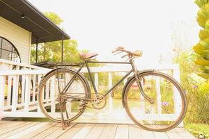 beautiful landscape image with Bicycle at sunset. photo