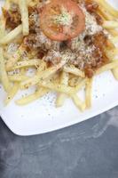 FRIED POTATOES WITH CHEESE TOPING photo