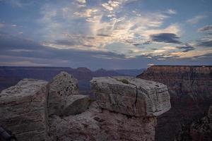 Tranquil View Of Rock Formations On Mountain under cloudy Sky photo