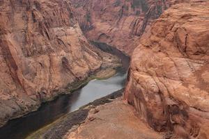 Colorado River Amidst Horseshoe Bend And Canyons photo