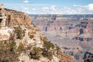 Scenic View Of Majestic Rocky Cliffs Against Cloudy Sky photo