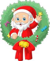 The Santa claus is coming out from the christmas wreath with the sparkling ornament vector