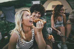 Couple Enjoy Barbecue In Nature photo