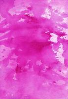 Watercolor bright pink splash background texture. Fuchsia liquid backdrop. Artistic watercolour overlay. Stains on paper. photo