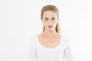 Beautiful caucasian woman in blank t shirt isolated on white background. Perfect Skin care and young female face. Copy space photo