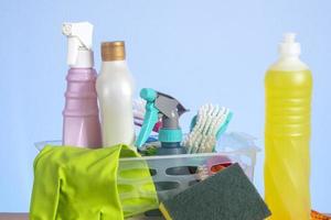 basket with cleaning products for home hygiene use photo