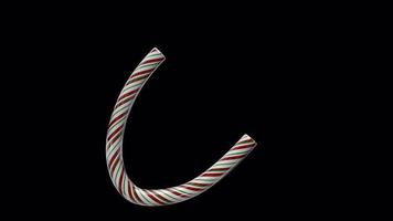 Glossy animated candy cane Christmas text typeface with alpha the character C video