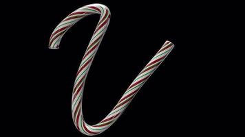 Glossy animated candy cane Christmas text typeface with alpha the character U video