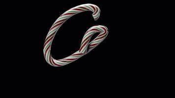 Glossy animated candy cane Christmas text typeface with alpha the character G video