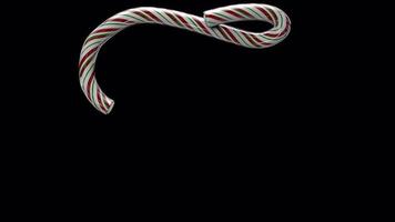 Glossy animated candy cane Christmas text typeface with alpha the character T video