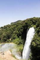 Marmore waterfall in Umbria region, Italy. Amazing cascade splashing into nature. photo