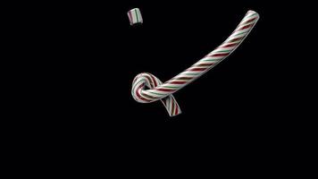 Glossy animated candy cane Christmas text typeface with alpha the character K video