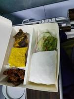A set of nasi rames sold on long-distance trains of PT. Indonesian Railways. photo