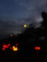 Defocused blurred abstract background of traffic jam at night in east Jakarta. photo