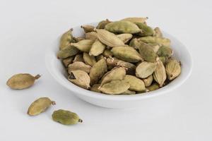 Green Cardamom Pods in a Bowl photo