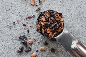 Chipotle Pepper Flakes Spilled from a Teaspoon photo