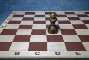 Chess board with figures. Wooden chess. Board games. Location of opponents. Counter strategy.  Pawn photo