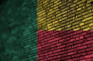 Benin flag is depicted on the screen with the program code. The concept of modern technology and site development photo