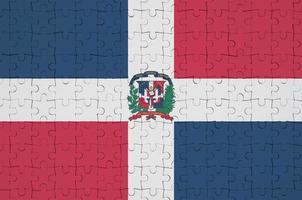 Dominican Republic flag is depicted on a folded puzzle photo