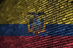Ecuador flag is depicted on the screen with the program code. The concept of modern technology and site development photo
