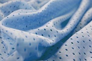 Blue mesh sport wear fabric textile background pattern photo