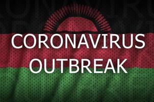 Malawi flag and Coronavirus outbreak inscription. Covid-19 or 2019-nCov virus