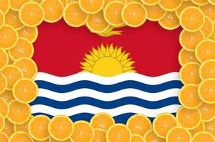 Kiribati flag in fresh citrus fruit slices frame photo