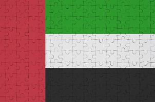 United Arab Emirates flag is depicted on a folded puzzle photo