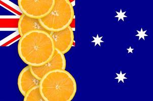 Australia flag and citrus fruit slices vertical row photo