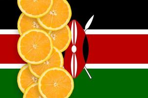 Kenya flag and citrus fruit slices vertical row photo