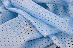 Blue mesh sport wear fabric textile background pattern photo
