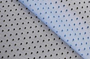 Blue mesh sport wear fabric textile background pattern photo