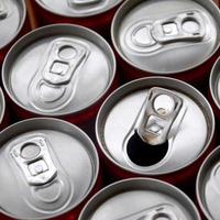 Many aluminium soda drink cans. Advertising for Soda drinks or tin cans mass manufacturing photo