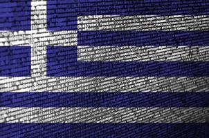 Greece flag is depicted on the screen with the program code. The concept of modern technology and site development photo